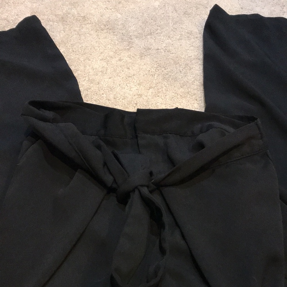 Flared leg pant with tie detail at waist